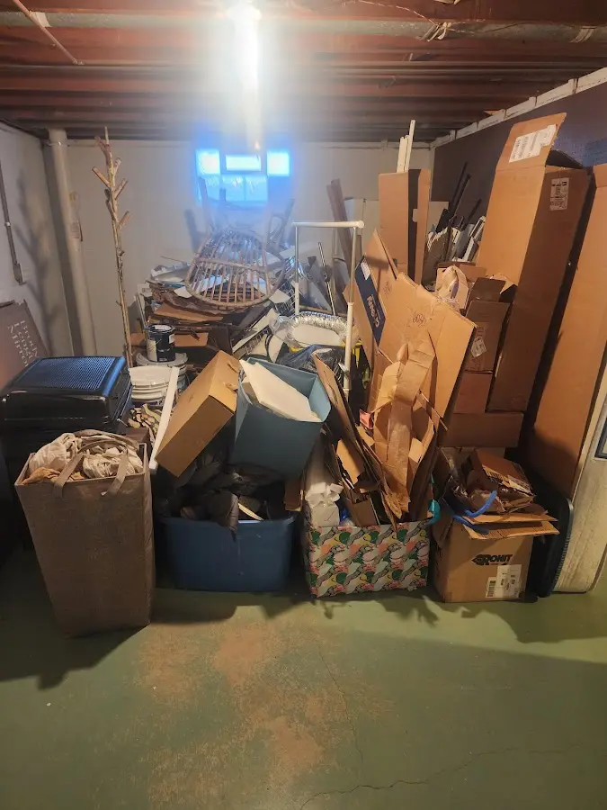 Roll-off dumpster container at job site for 2 Yard Dumpster Rental in Accokeek